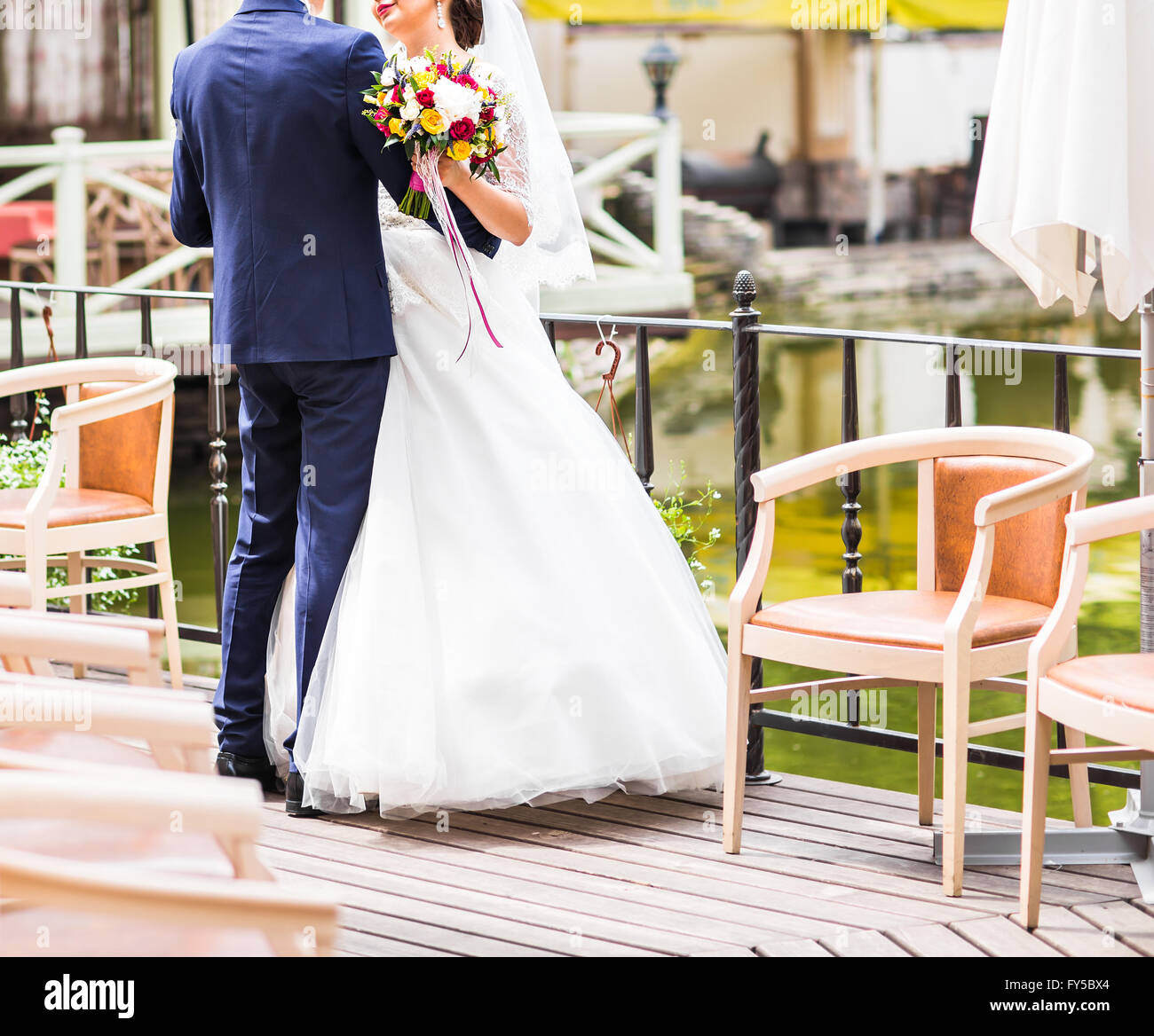 Young wedding couple enjoying romantic moments outdoors Stock Photo - Alamy