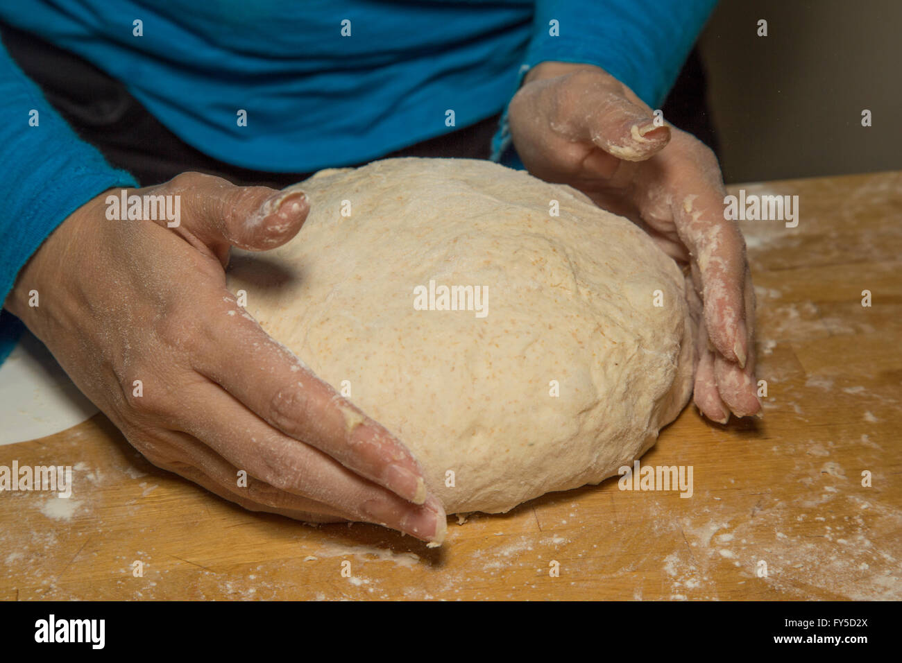 kneading bread dough Stock Photo
