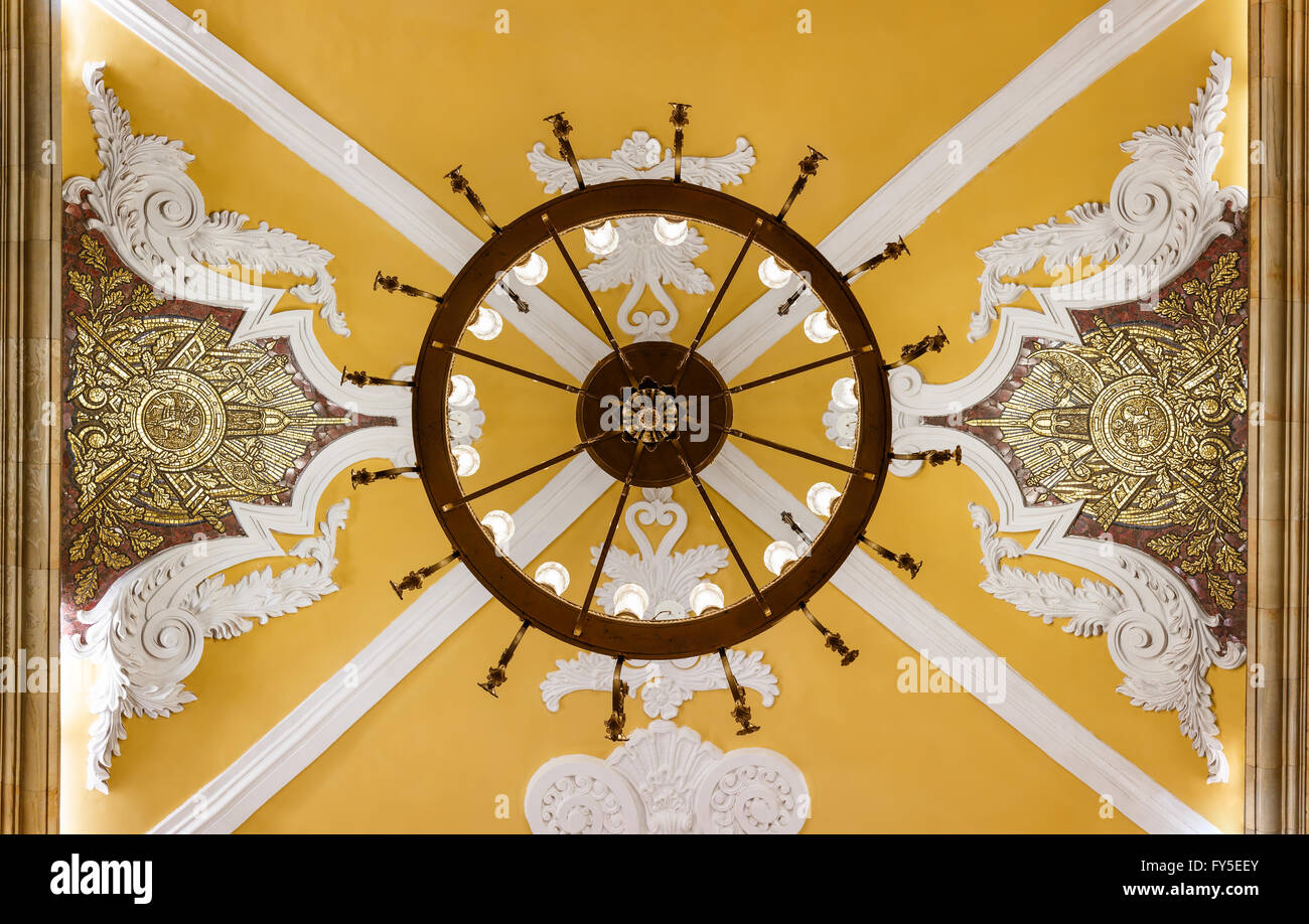 Close-up of chandelier and arhitecture details at ceiling of Komsomolskaya metro station Stock Photo