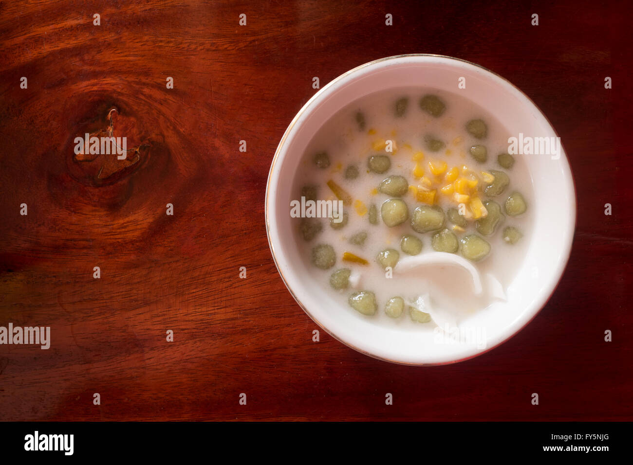 Rice flour ball in sweet coconut milk with coconut and corn , Bua Loi