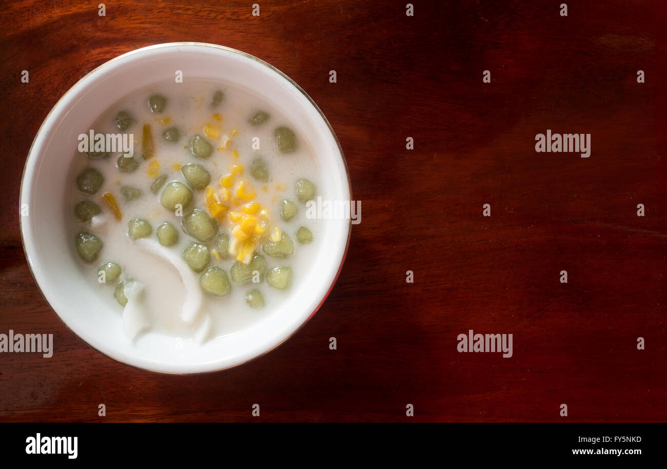 Rice flour ball in sweet coconut milk with coconut and corn , Bua Loi