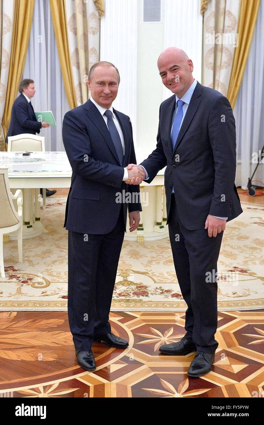 Russian President Vladimir Putin greets FIFA President Gianni Infantino before their meeting at the Kremlin April 20, 2016 in Moscow, Russia. Stock Photo
