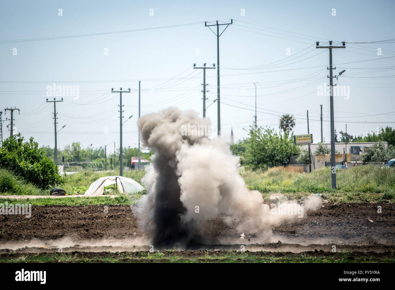 Kilis, Turkey. 22nd Apr, 2016. Unexploded grenades, which fell from the syrian side of the border, are detonated under controlled conditions by Turkish security forces along the border area in Kilis, Turkey, 22 April 2016. Photo: Uygar Onder Simsek/dpa/Alamy Live News Stock Photo