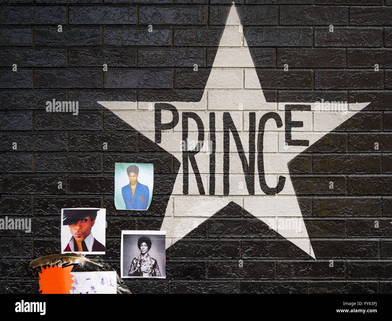 Minneapolis, MN, USA. 22nd Apr, 2016. Prince's star on the wall of 1st Ave in Minneapolis. Thousands of people came to 1st Ave in Minneapolis Friday to mourn the death of Prince, whose full name is Prince Rogers Nelson. 1st Ave is the nightclub the musical icon made famous in his semi autobiographical movie ''Purple Rain.'' Prince, 57 years old, died Thursday, April 21, 2016, at Paisley Park, his home, office and recording complex in Chanhassen, MN. Credit: Jack Kurtz/ZUMA Wire/Alamy Live News Stock Photo