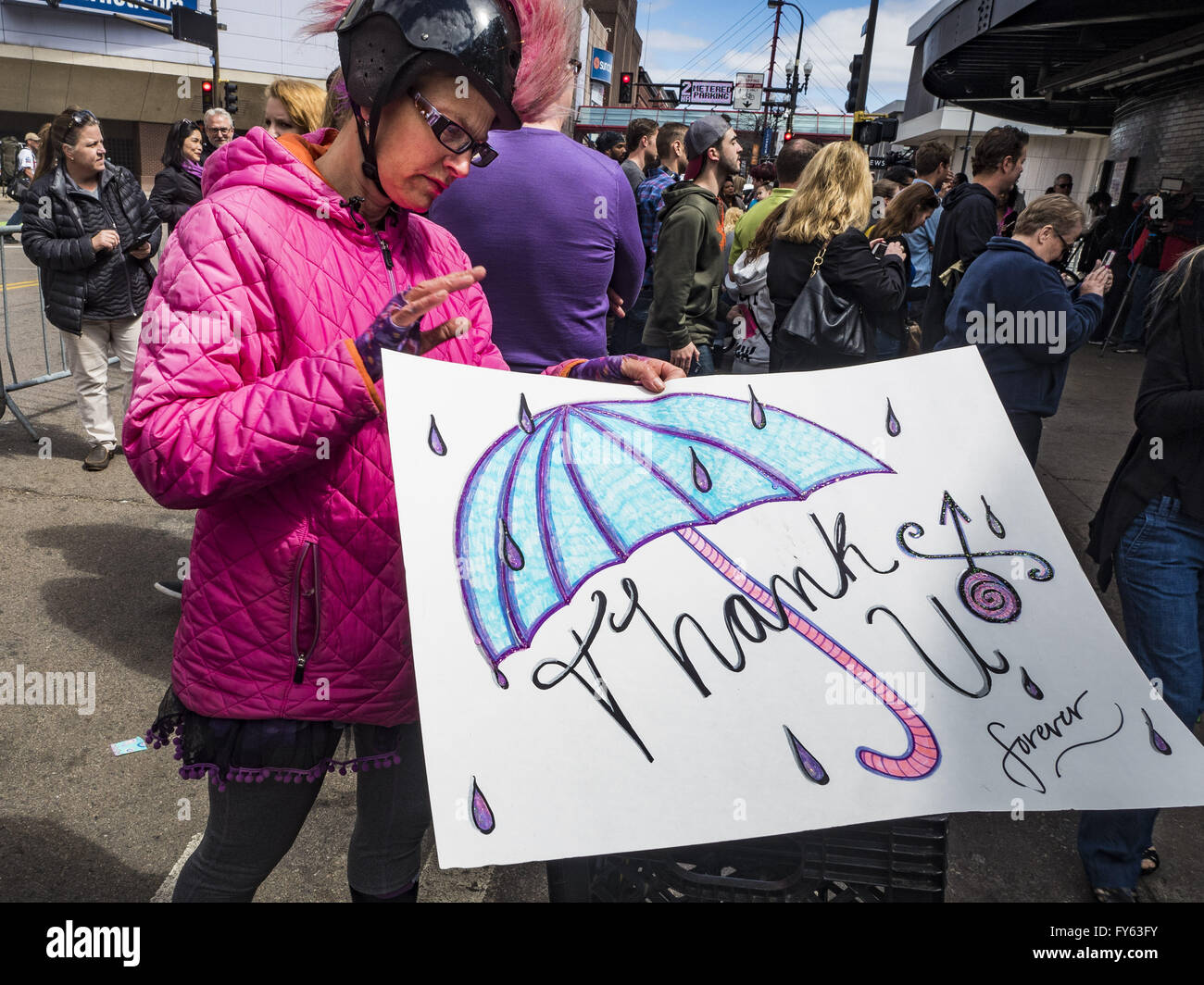 Minneapolis, MN, USA. 22nd Apr, 2016. MINA LEIERWOOD, from Minneapolis, MN, brings a thank you card to the memorial for Prince at 1st Ave in Minneapolis. She said she listened to Prince's music all through high school. Thousands of people came to 1st Ave in Minneapolis Friday to mourn the death of Prince, whose full name is Prince Rogers Nelson. 1st Ave is the nightclub the musical icon made famous in his semi autobiographical movie ''Purple Rain.'' Prince, 57 years old, died Thursday, April 21, 2016, at Paisley Park, his home, office and recording complex in Chanhassen, MN. (Credi Stock Photo