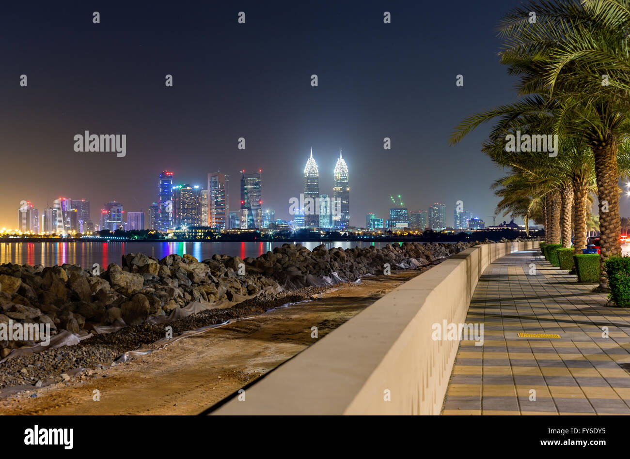 Dubai Business Central Twin Towers Panoramic skyline view from Palm Jumeirah Stock Photo