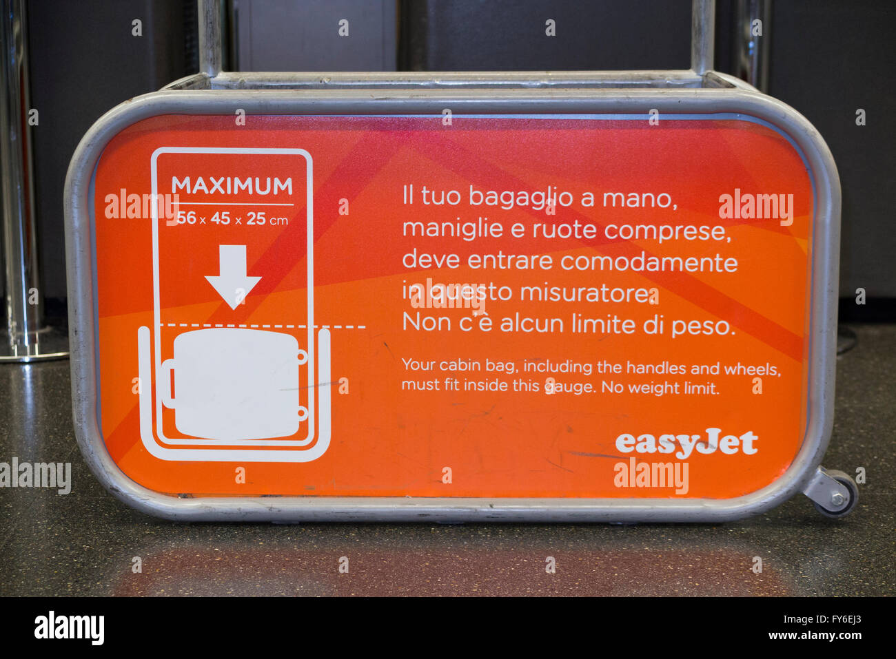 Easyjet bag size frame cage tester to measure dimensions of passenger hand  held carry on flight hand luggage Milan Airport Italy Stock Photo - Alamy