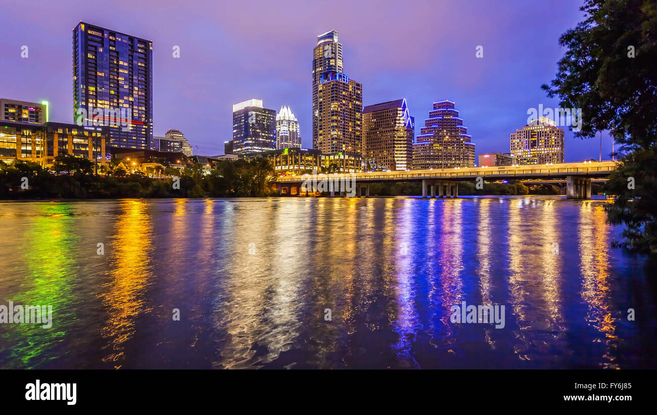 City lights come on in Austin, Texas downtown skyline at night Stock Photo