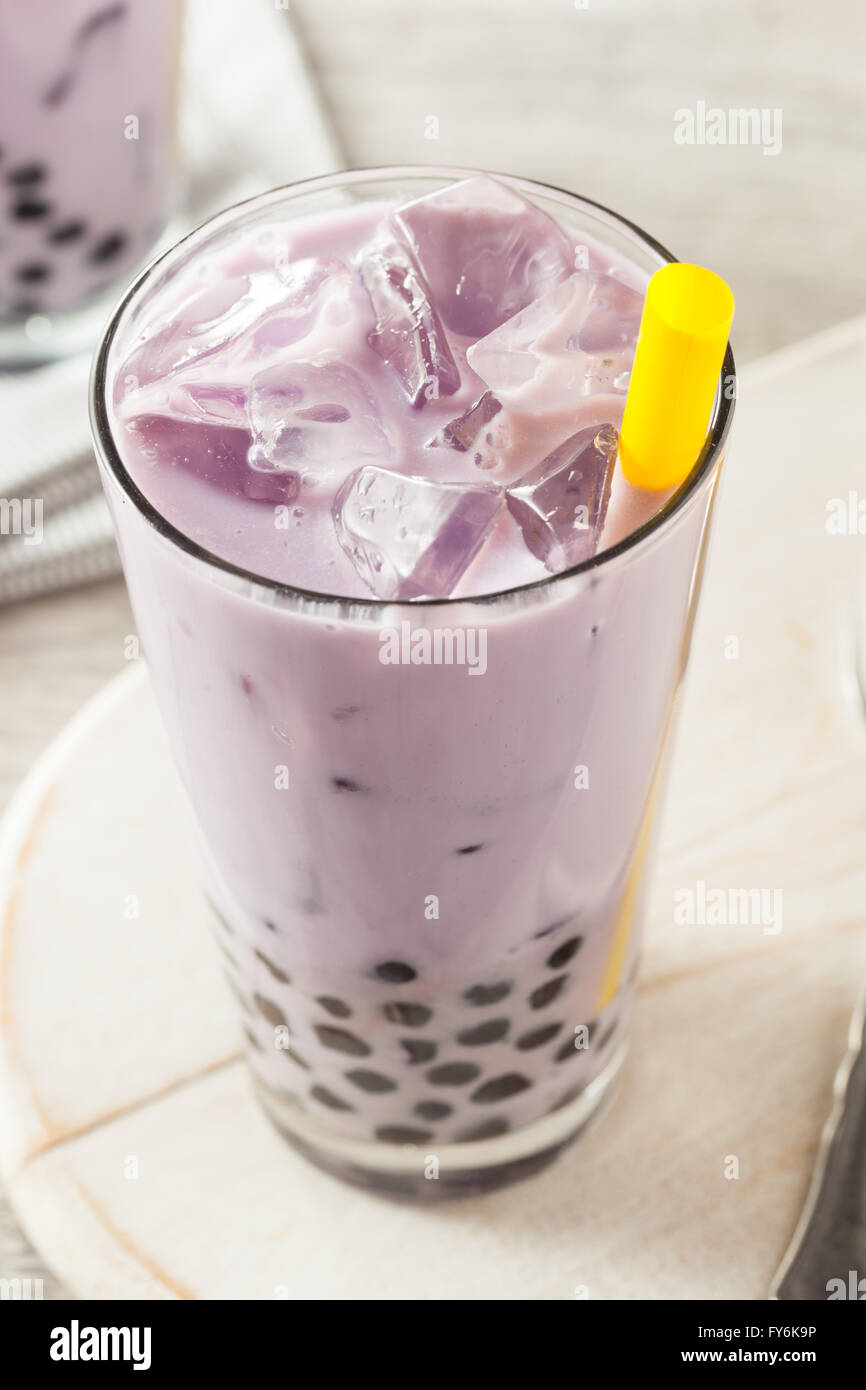 Homemade Taro Milk Bubble Tea with Tapioca Pearls Stock Photo