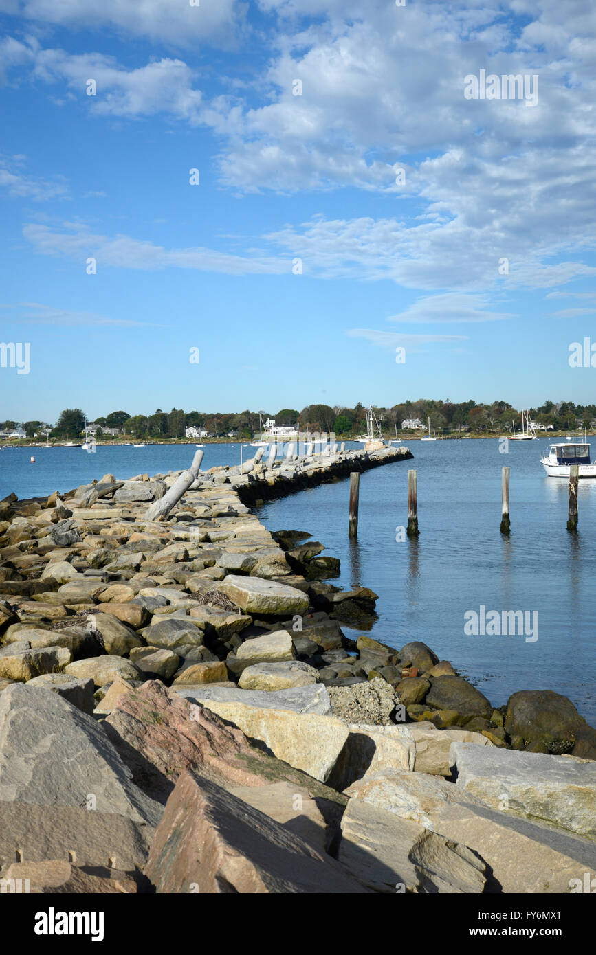 rock wall protecting a harbor in Stonington Connecticut Stock Photo