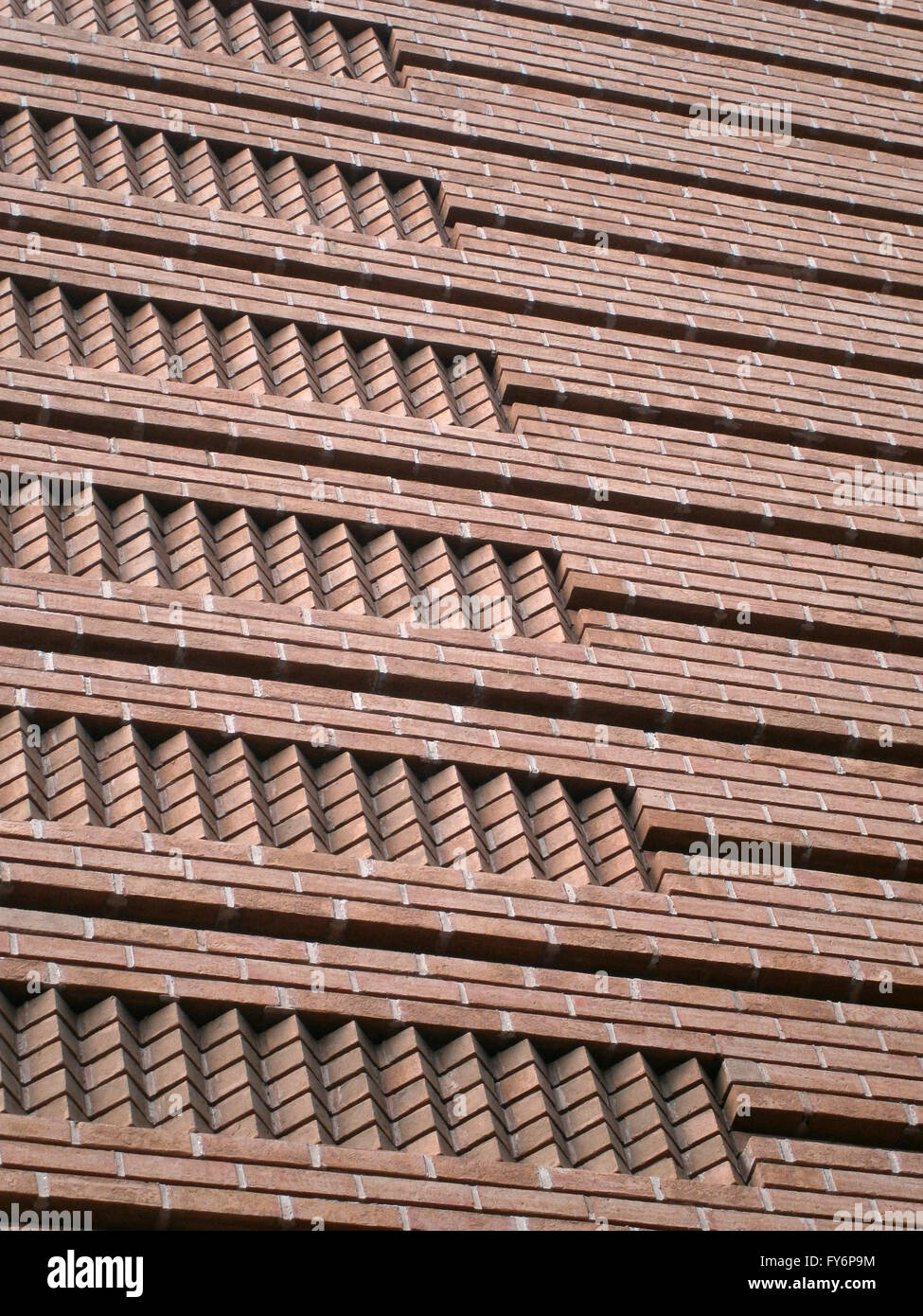 Red Brick pattern side of building in San Francisco, California. Stock Photo