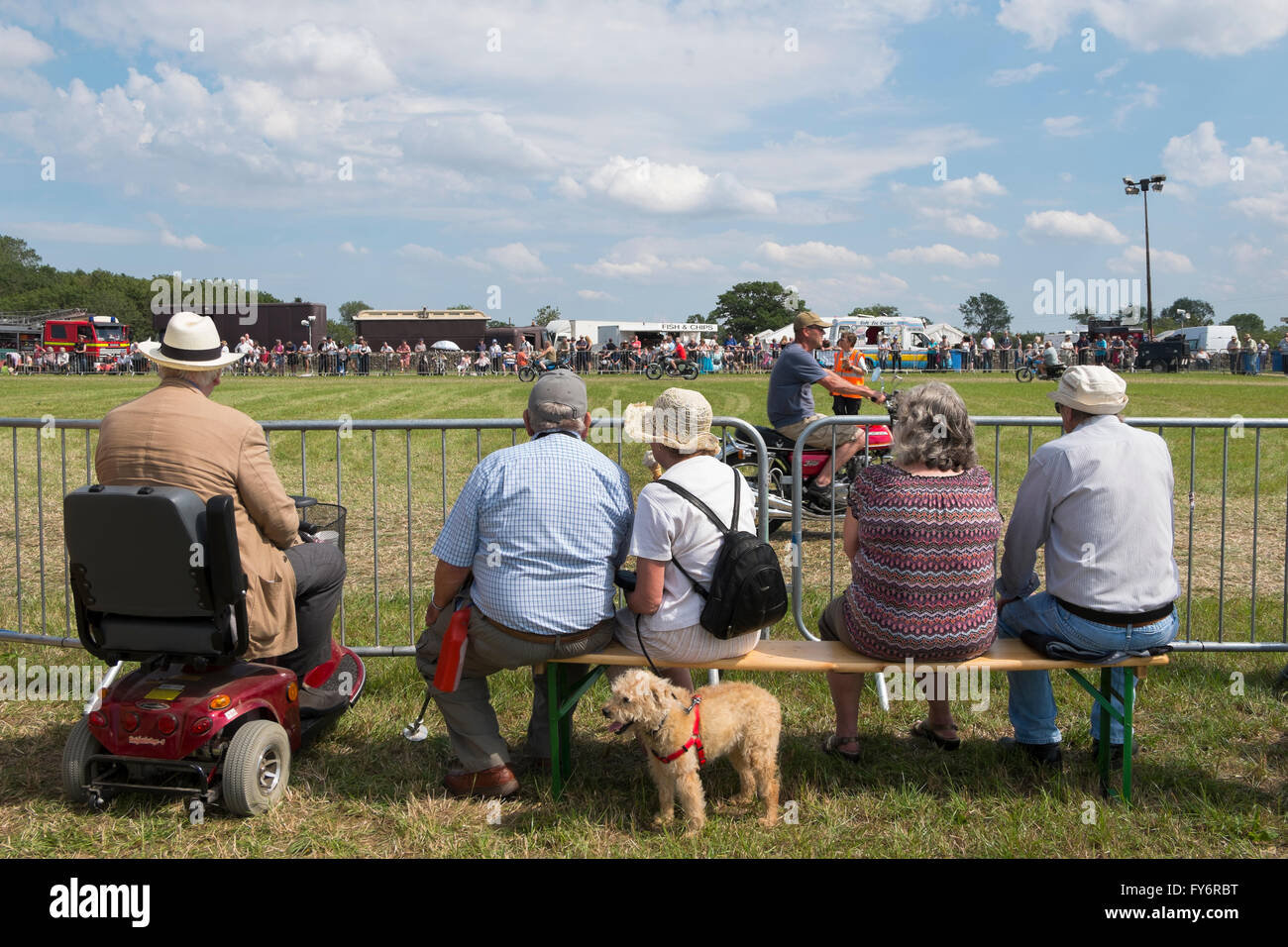 Spectators sitting around the show ring at the Fairford Steam Rally ...