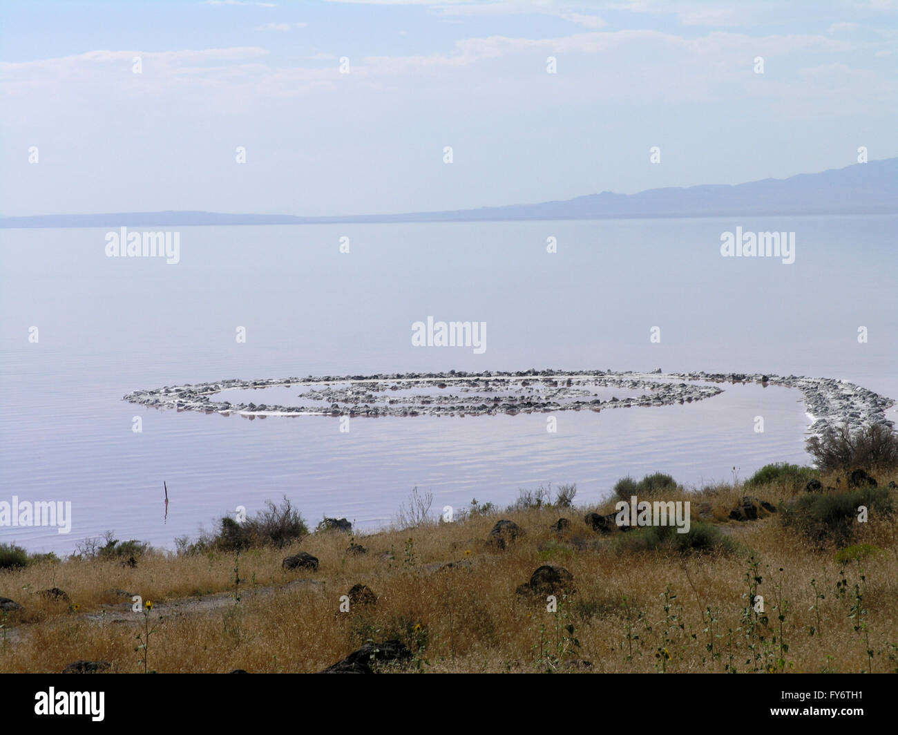 Spiral Jetty full view from shore, Robert Smithson's masterpiece earthwork, on the north side of the Great Salt Lake, about two- Stock Photo