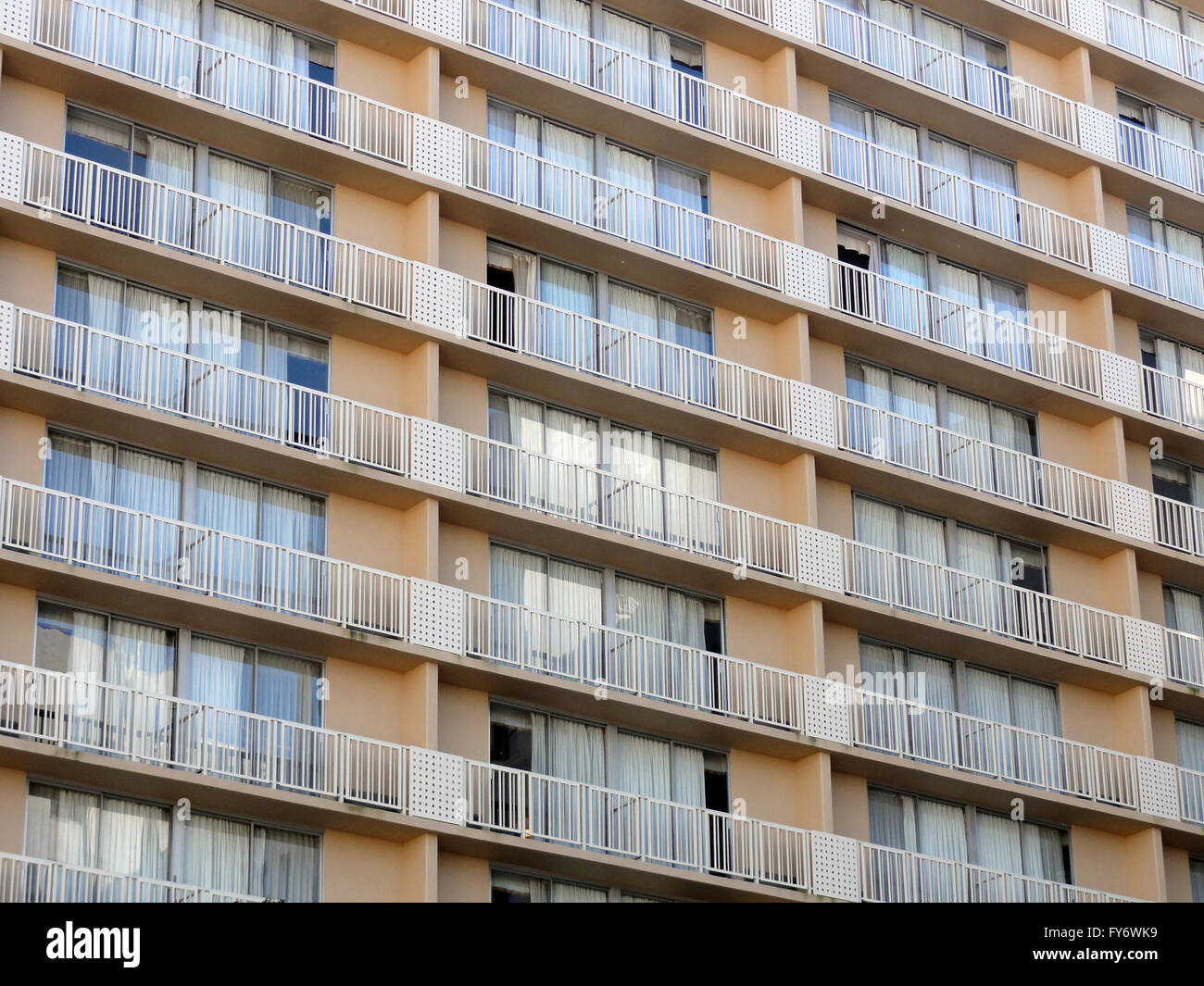 Apartments with balconies pattern with sliding glass window doors in