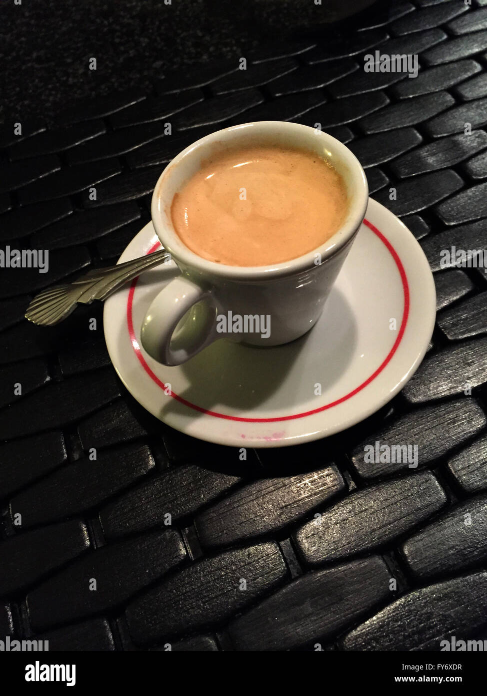 Espresso Coffee served in demitasse cup. Stock Photo