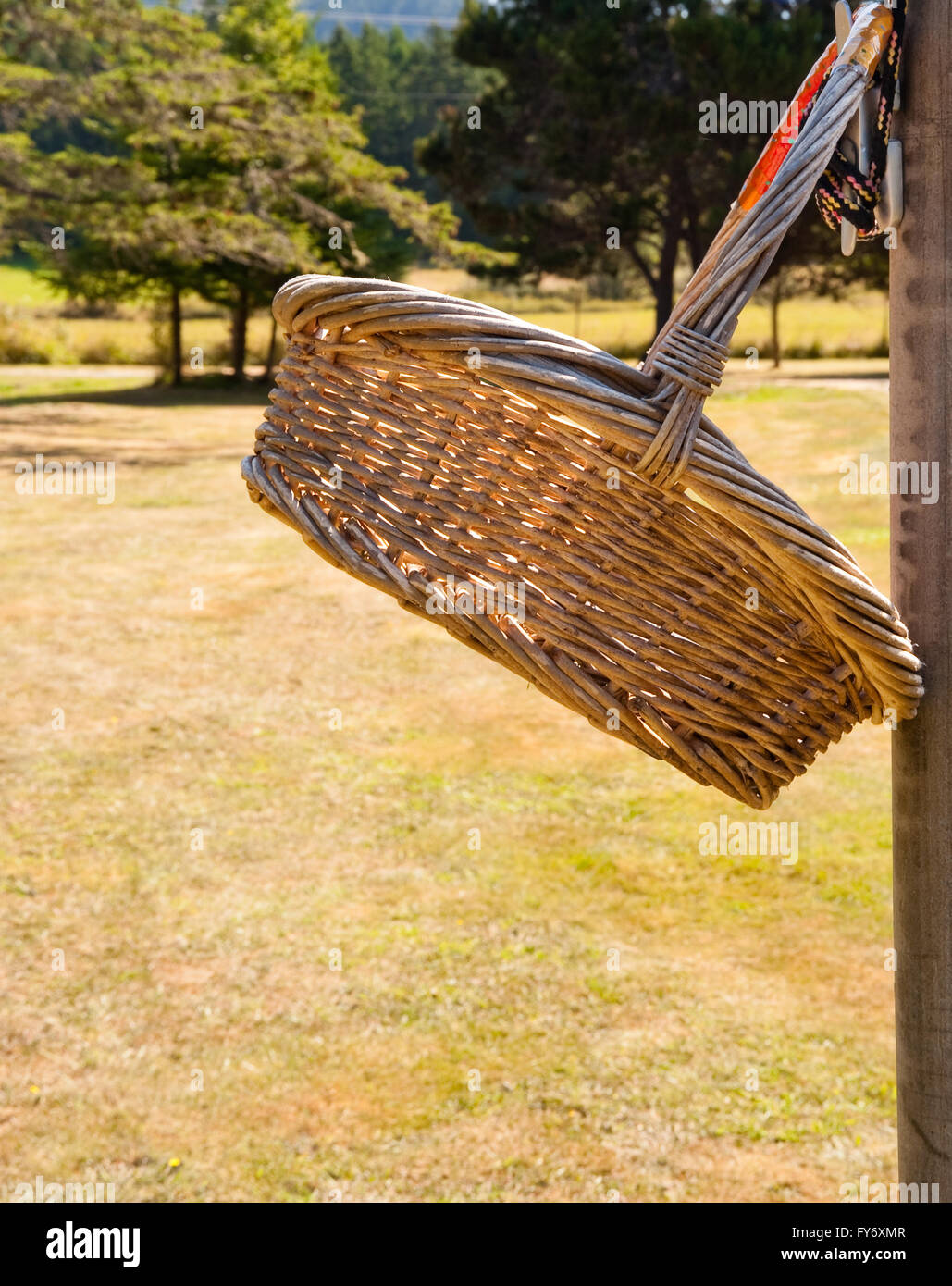 Basket hanging on a clothesline Stock Photo