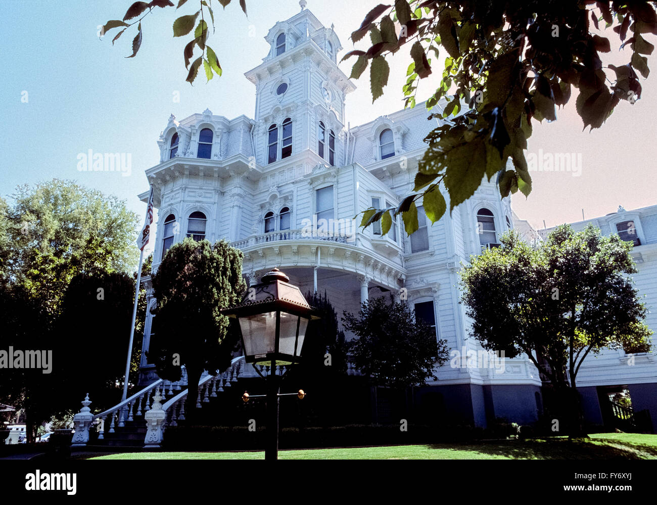 This 1877 Victorian mansion in Sacramento is once again home to the governor of the state of California, USA. The ornate three-story, 30-room wooden house served 13 governors and their families from 1903 to 1967 until the last residents, Nancy and Ronald Reagan, deemed it a fire trap and moved out. The dwelling was then opened to the public as the Governor's Mansion State Historic Park until 2015 when then governor, Jerry Brown, agreed to move in after major renovations were done. The official state residence is known for its Second Empire-Italianate styles of architecture. Stock Photo