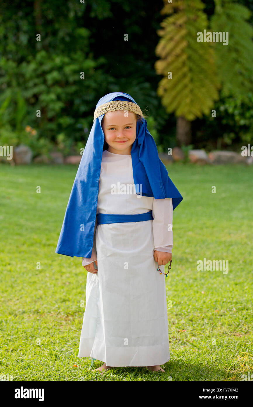 Little girl dressed as Mother Mary for school nativity play Stock Photo Alamy