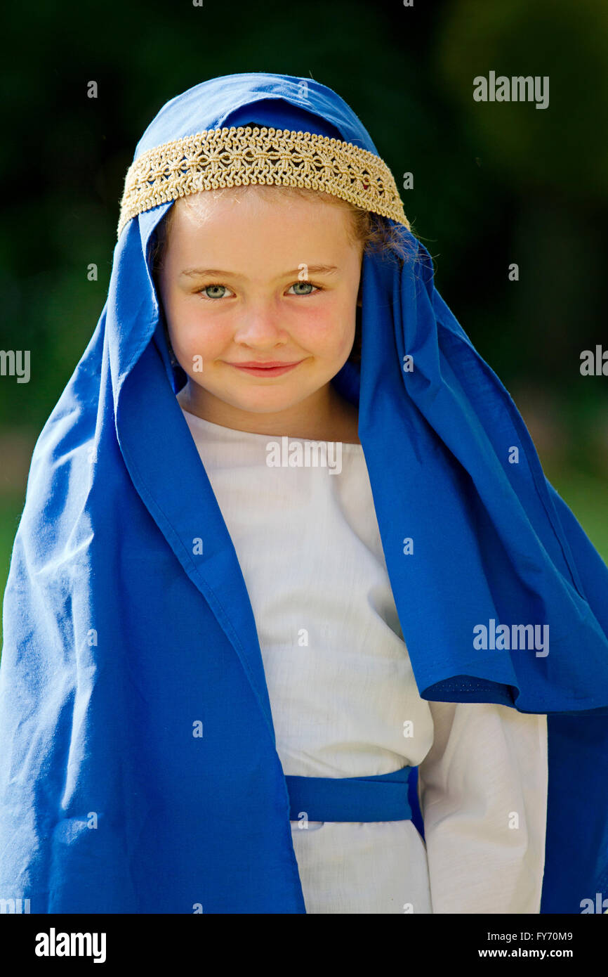 Little girl dressed as Mary for school nativity play Stock Photo Alamy