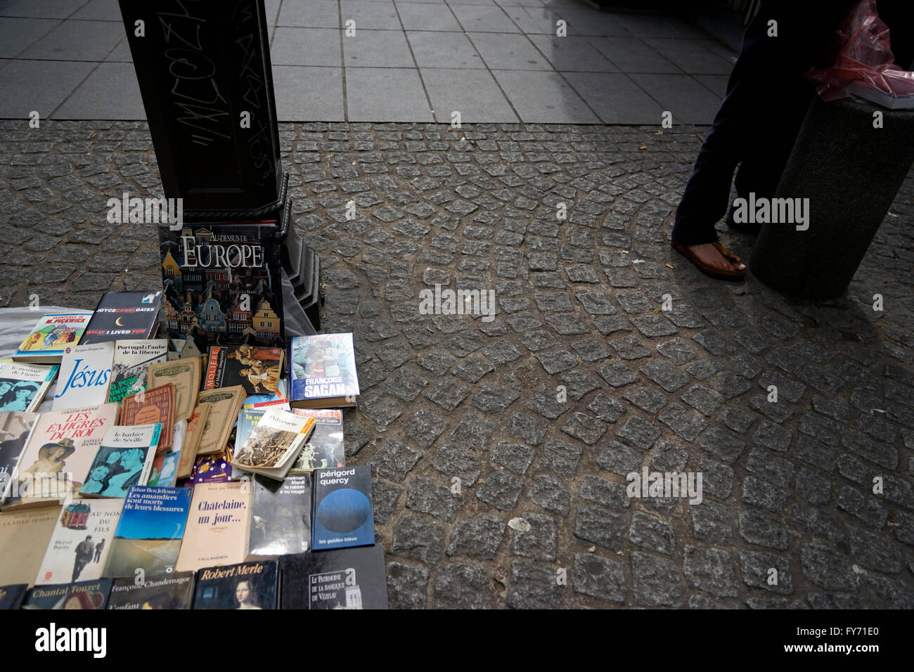 Hand books sake on sidewalk hires stock photography and images Alamy