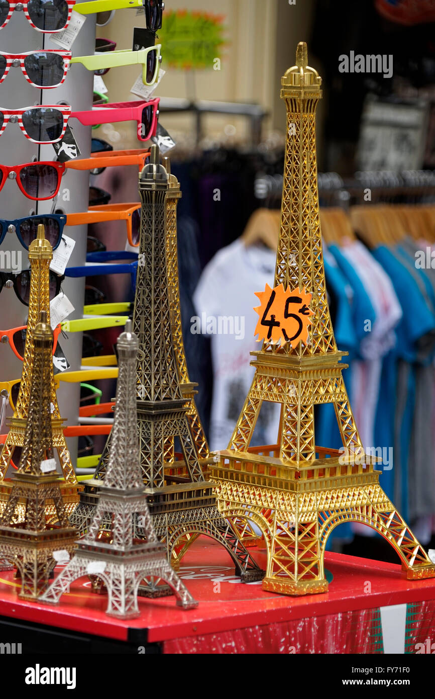 Miniature metal Eiffel Tower for sale as souvenir in a Parisian souvenir shop. Paris,France Stock Photo