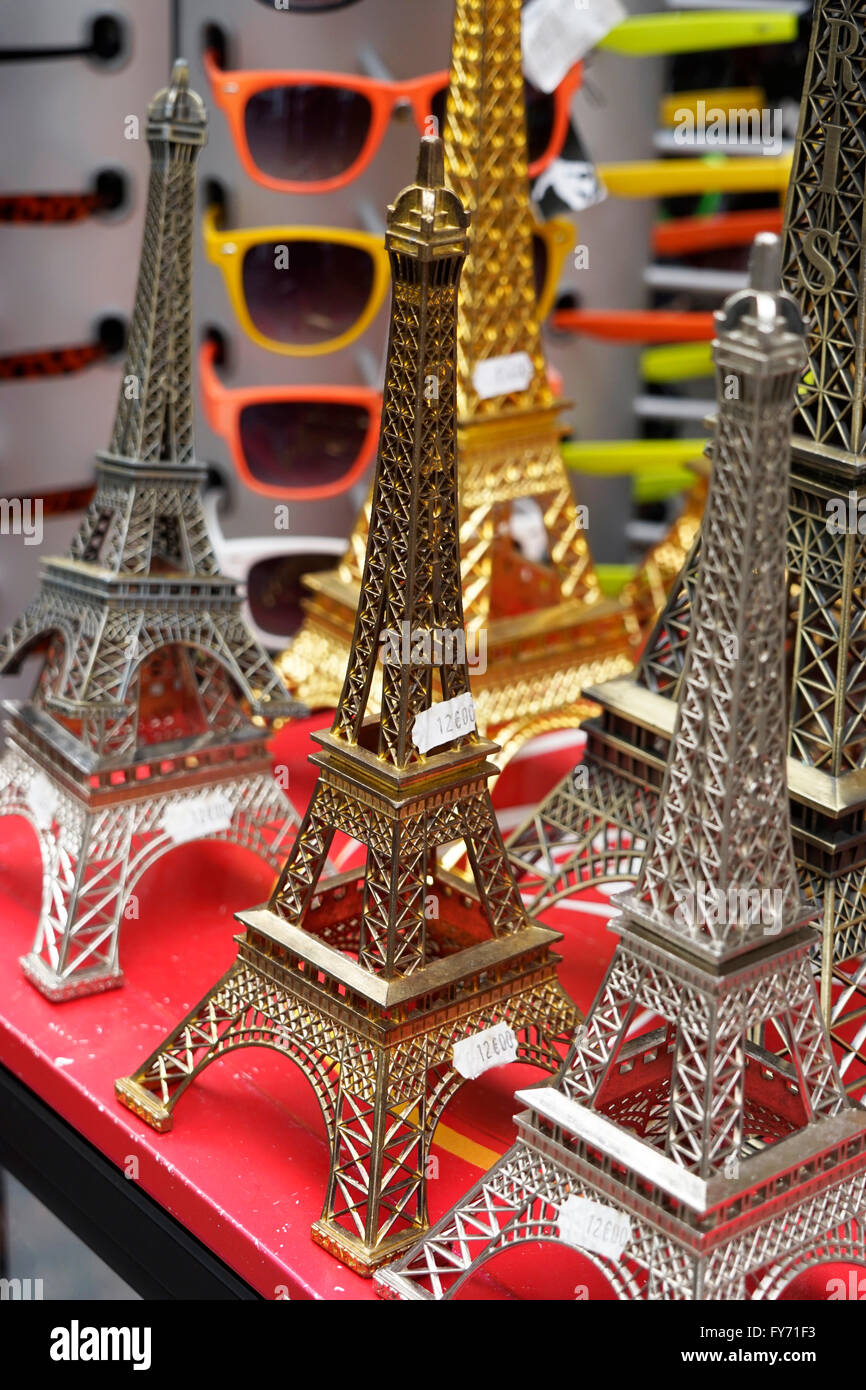 Miniature metal Eiffel Tower for sale as souvenir in a Parisian souvenir  shop. Paris,France Stock Photo - Alamy