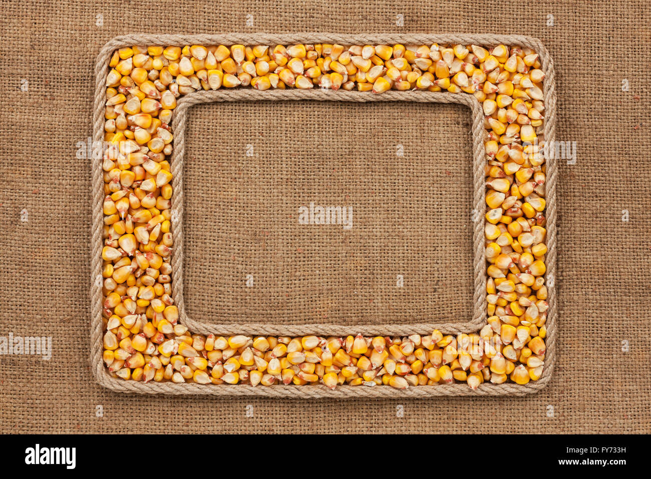 Two frame made of rope with corn grains on sackcloth, with place for ...