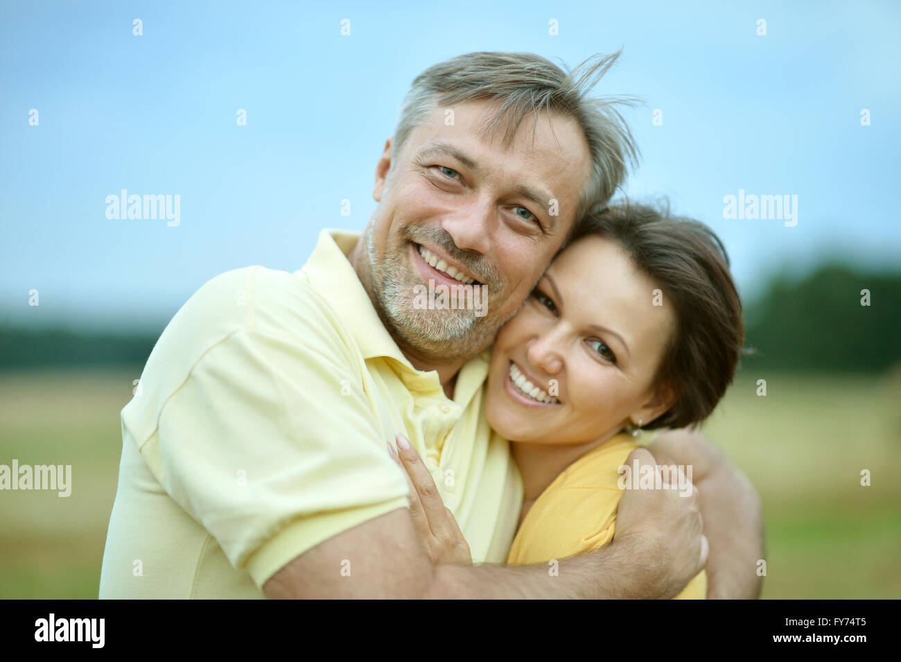 couple in summer park Stock Photo - Alamy