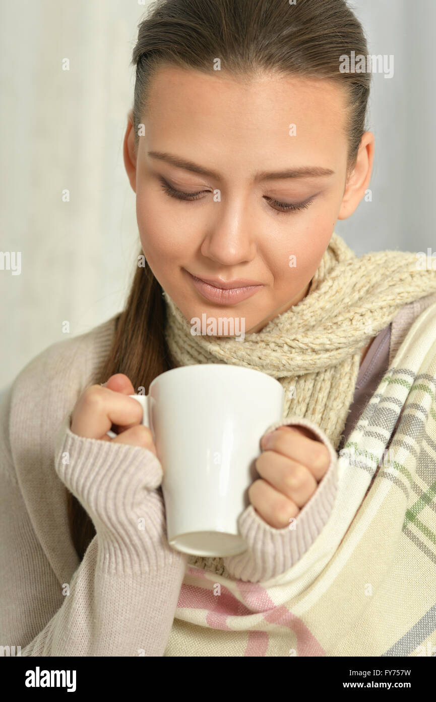 sick woman drinking hot tea Stock Photo Alamy