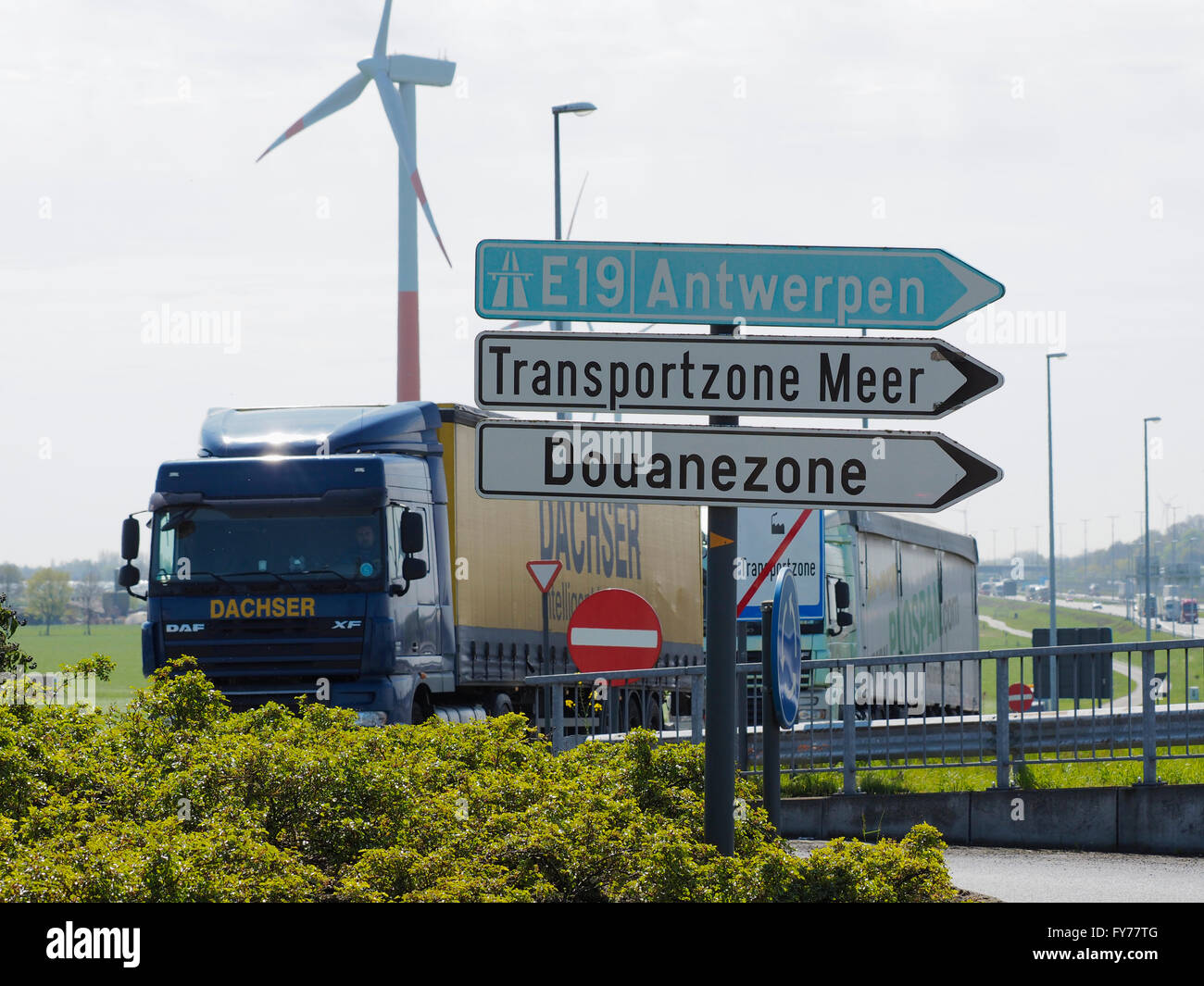 Trucks near the Belgian-Dutch border at Hazeldonk, and the transport and customs zone in Meer. Stock Photo