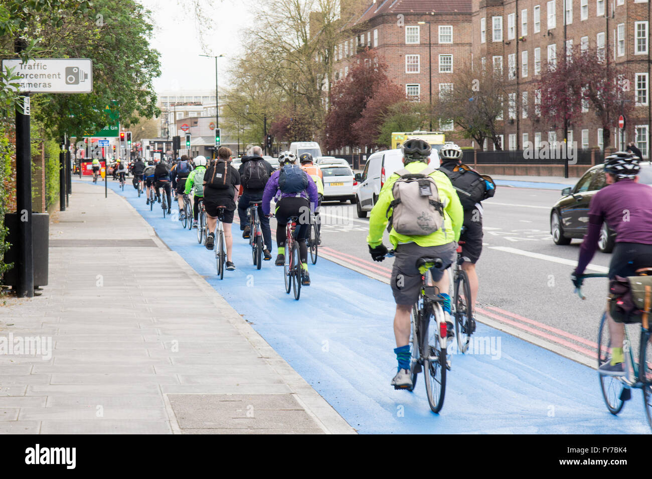 Cyclists using the newly opened segregated Cycle Superhighway at Kennington Oval in South London. Stock Photo