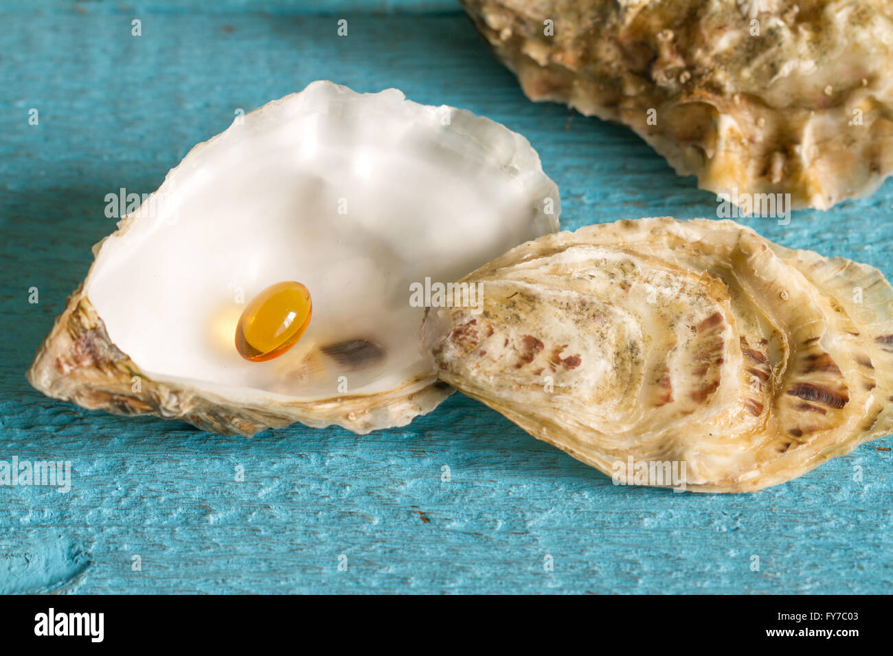 Omega 3 pill in oyster like pearl diet concept Stock Photo