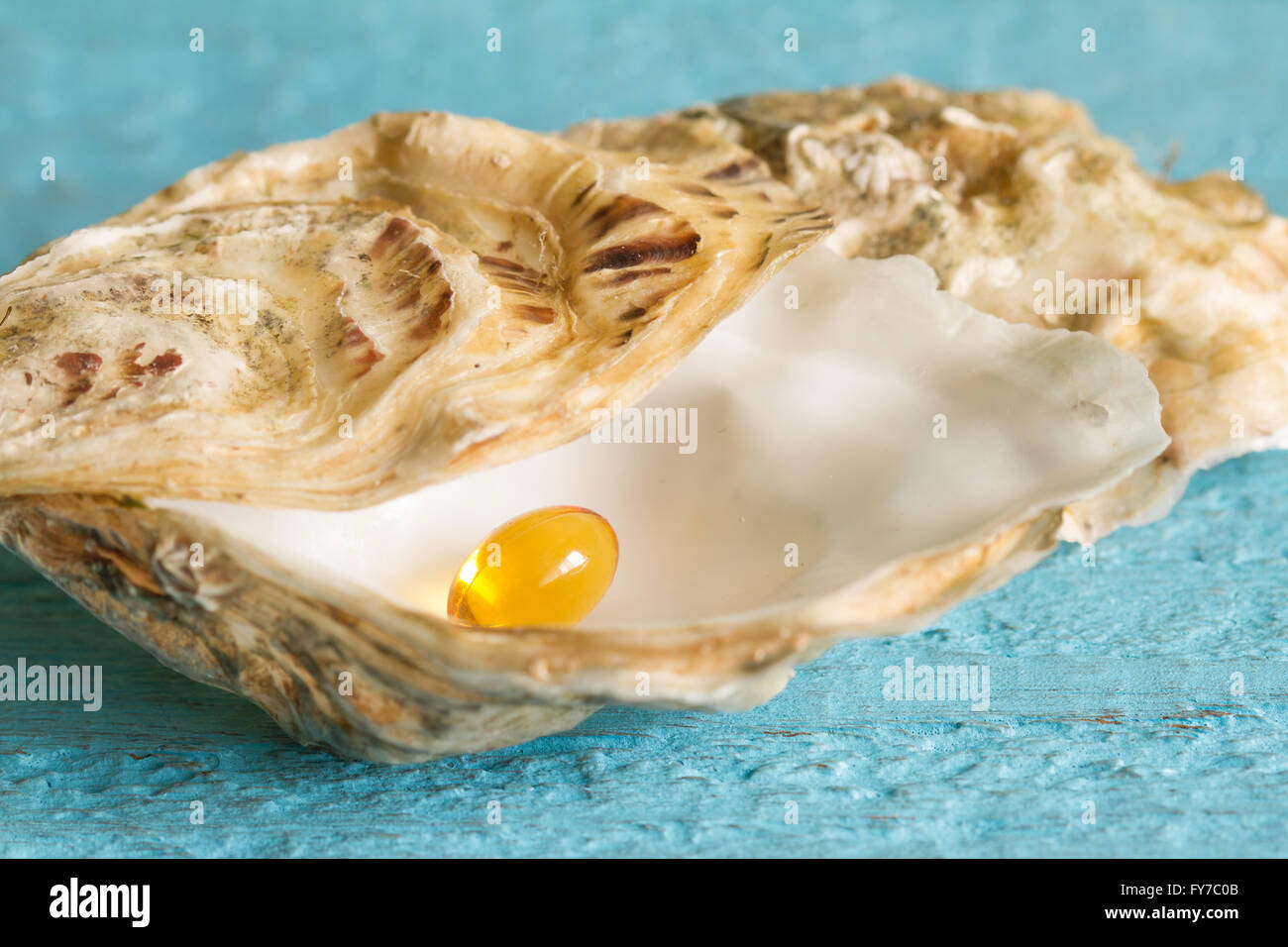 Omega 3 pill in oyster like pearl diet concept Stock Photo