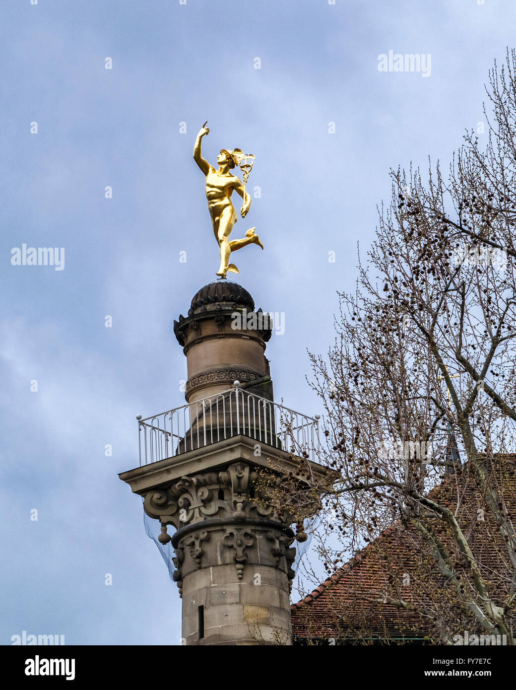 Gilt statue of Roman God, Mercury, on column outside the Alte Kanzlei in Stuttgart, Germany Stock Photo