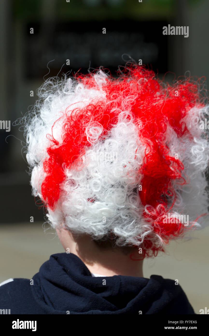 Young boy wearing an England flag wig Stock Photo Alamy