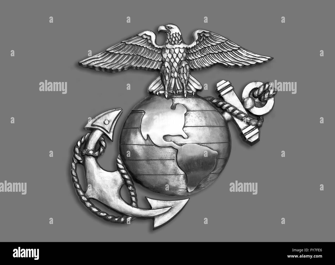 Marine eagle,globe and anchor brass emblem in black and white. Stock Photo