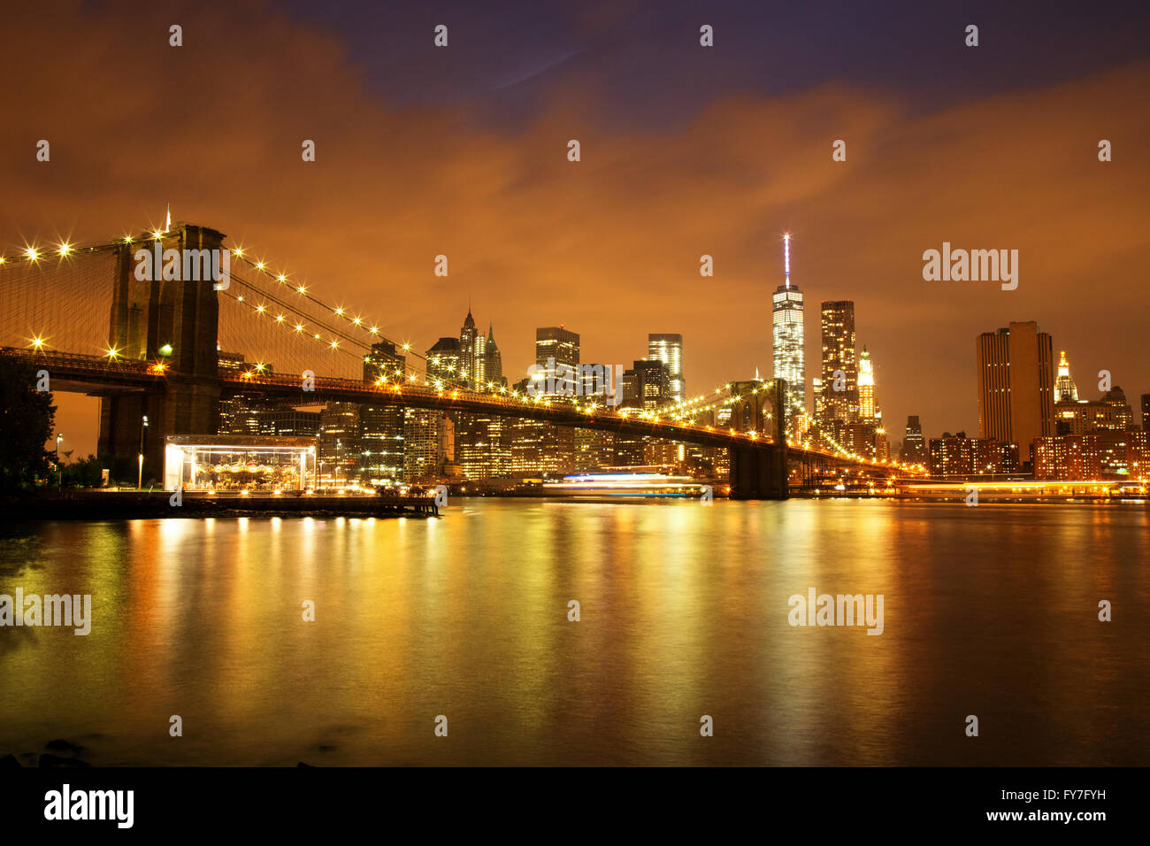 New York City Manhattan Downtown with Brooklyn Bridge at dusk Stock ...