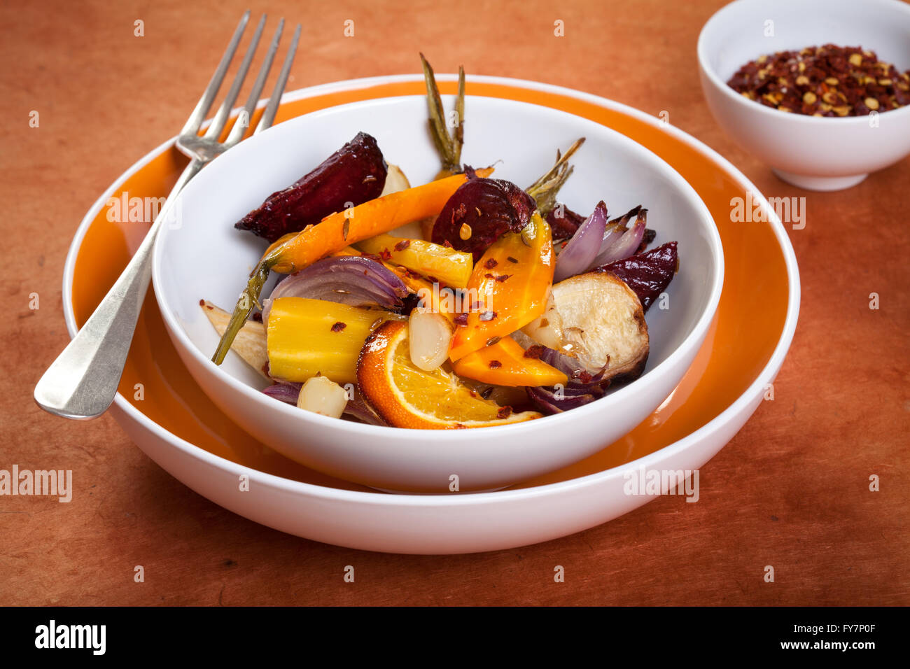 organic oven baked vegetable with spice chilis Stock Photo