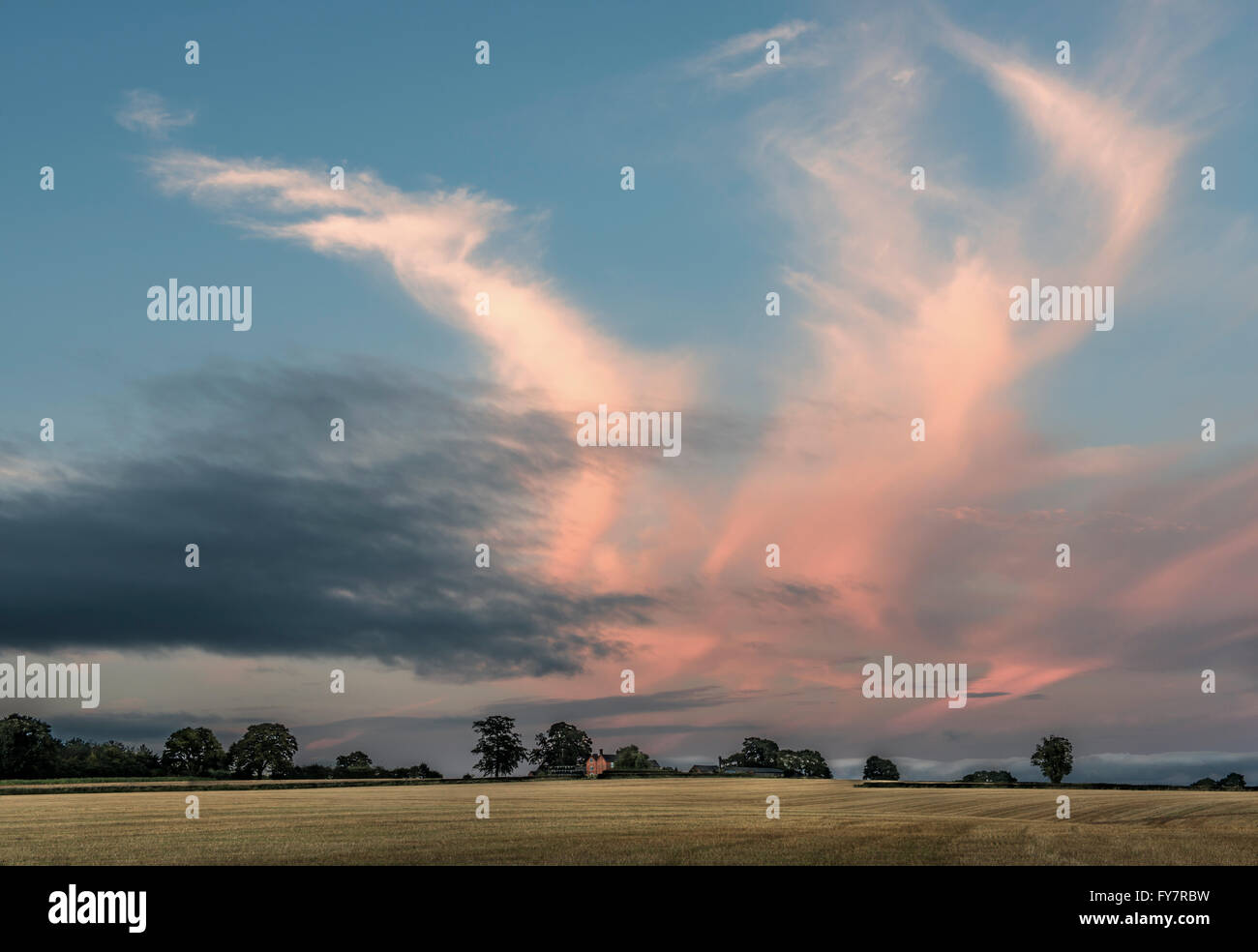 Evening red sky over farmland, Derbyshre, England Stock Photo