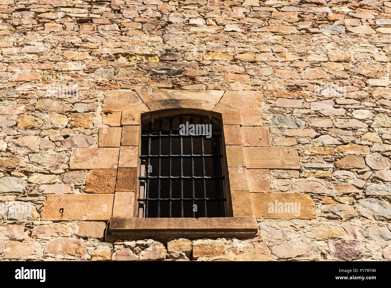 Old stone wall with a latticed window as background Stock Photo - Alamy