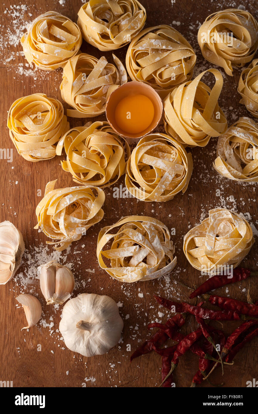 fettuccine pasta italian food still life rustic flat lay wood