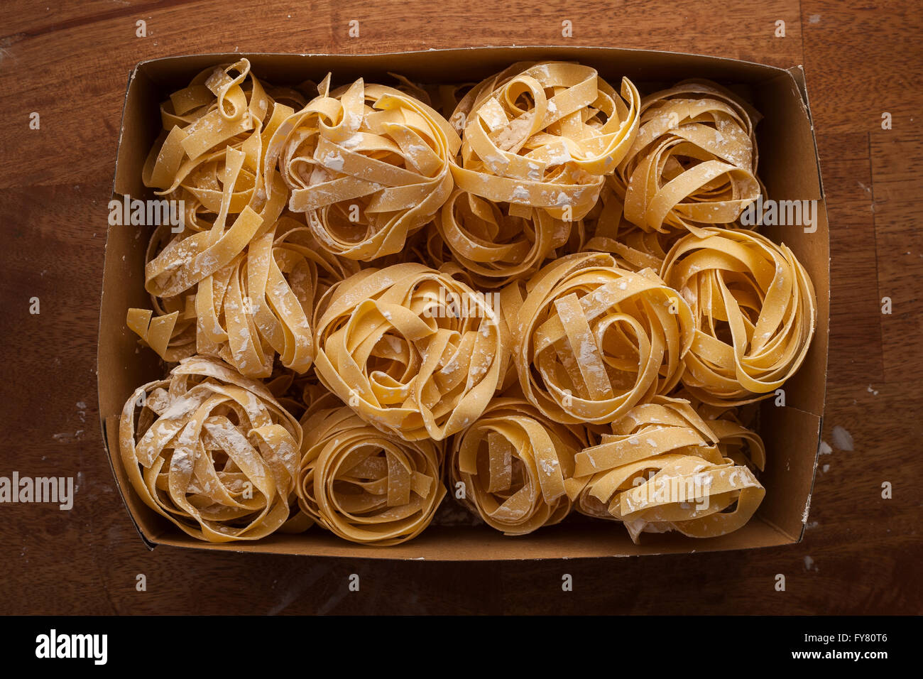 fettuccine pasta italian food still life rustic flat lay background tagliatelle alfredo Stock Photo