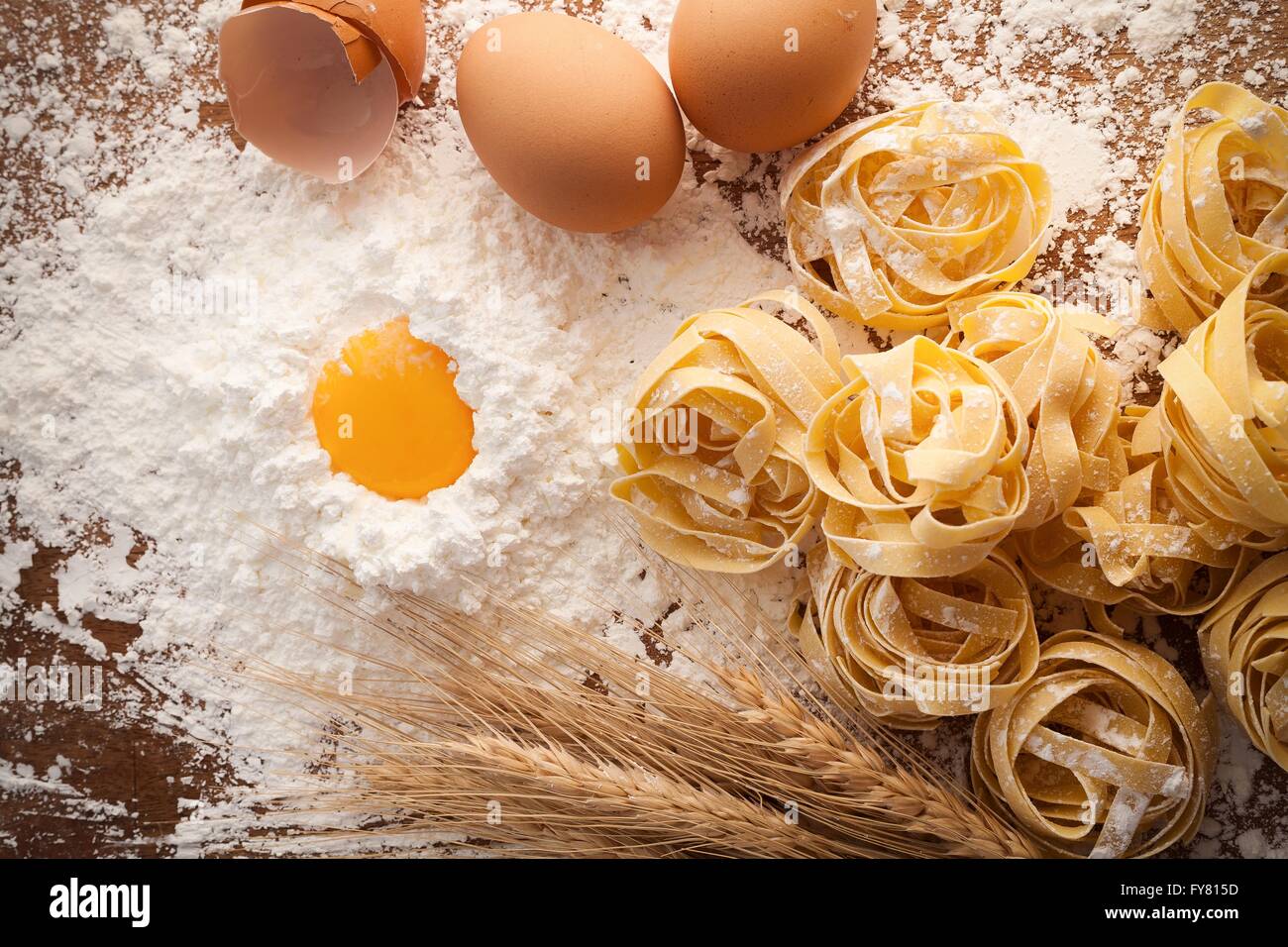 fettuccine pasta italian food still life rustic flat lay wood