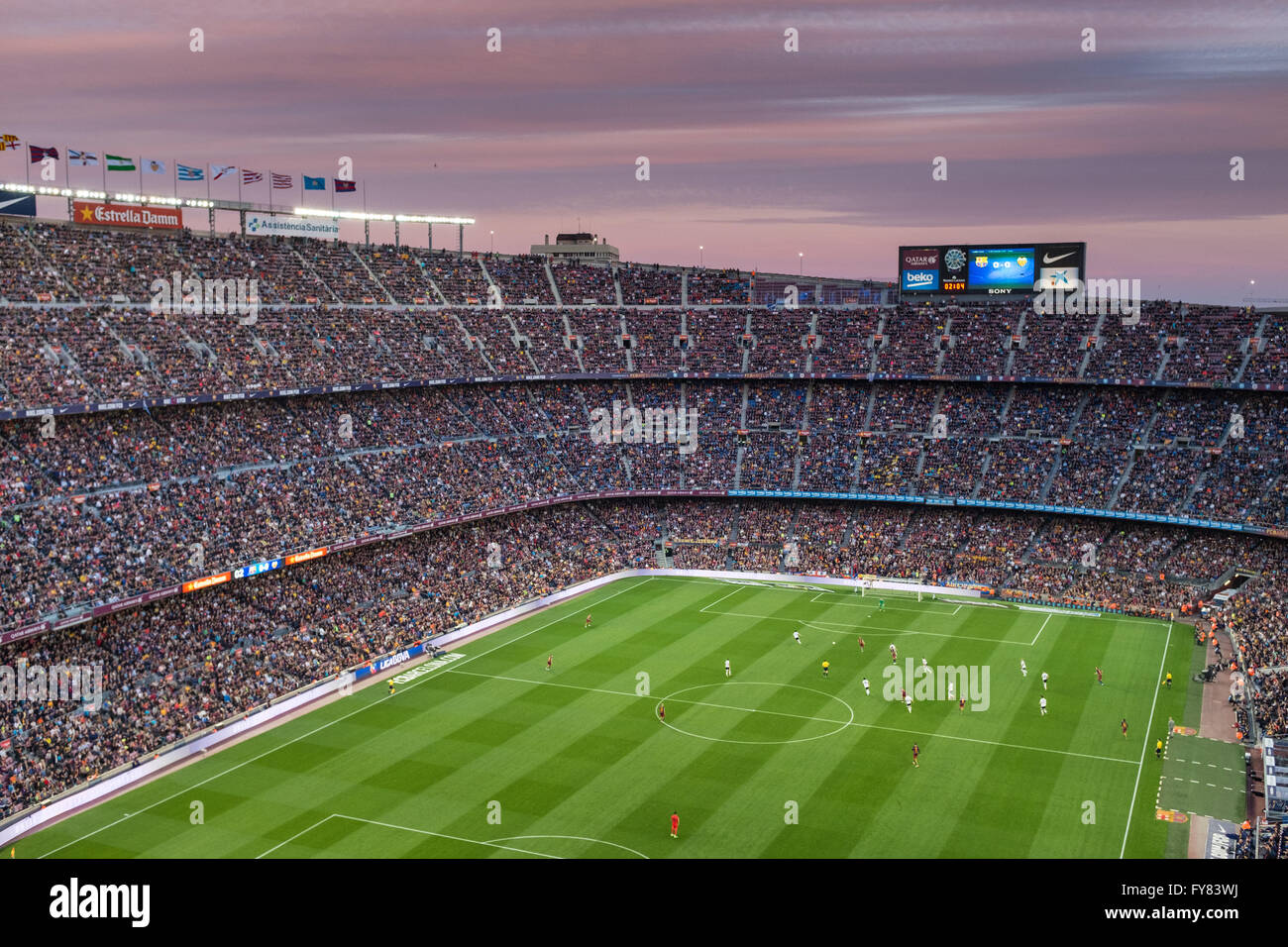 Camp Nou football stadium in Barcelona.Sunset is coloring clouds  making even better the overall view as we watch FC Barca playing for Spanish La Liga Stock Photo