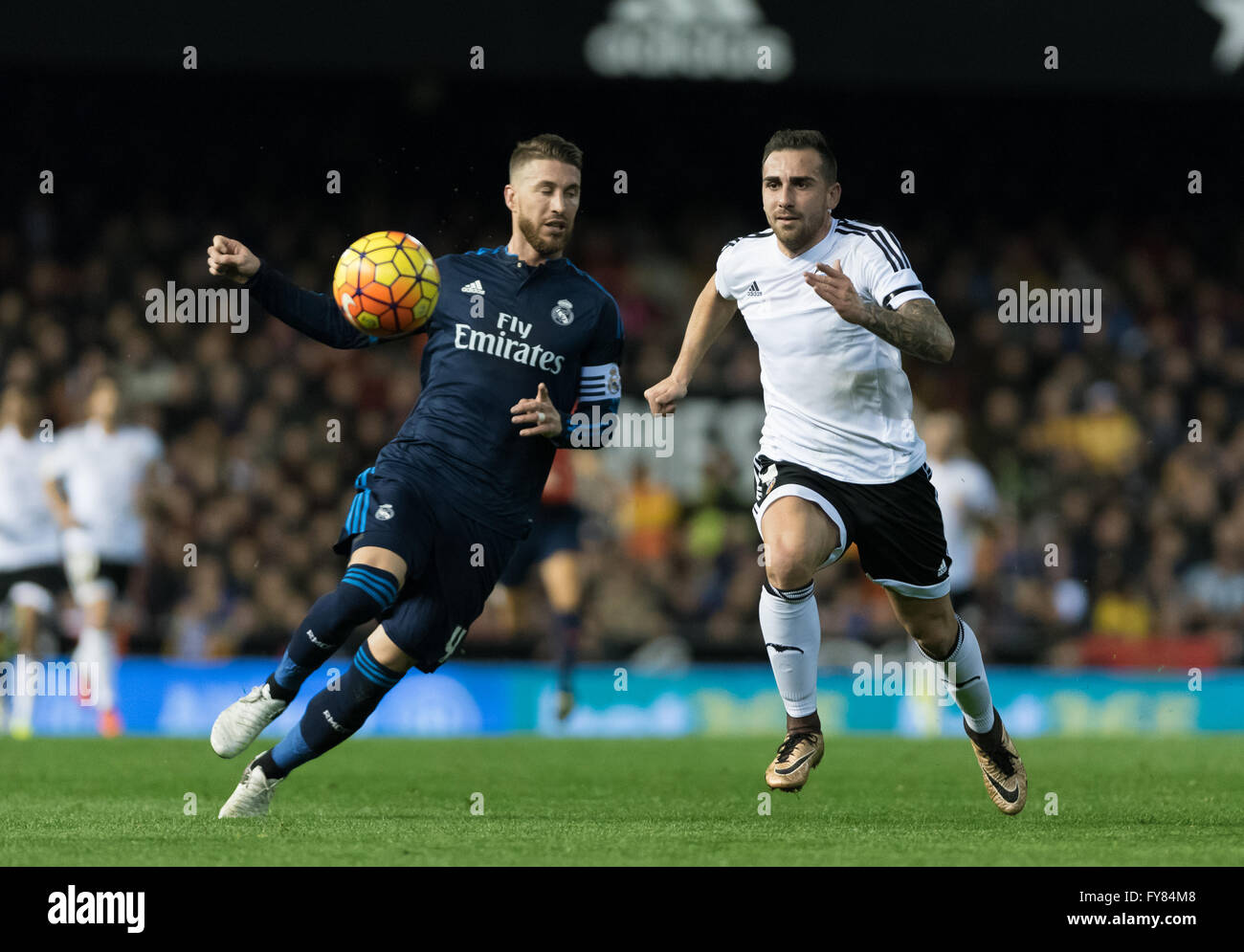 Paco Alcacer of Valencia CF and Sergio Ramos of Real Madrid CF fighting to the ball during the Liga BBVA match, at Mestalla. Stock Photo
