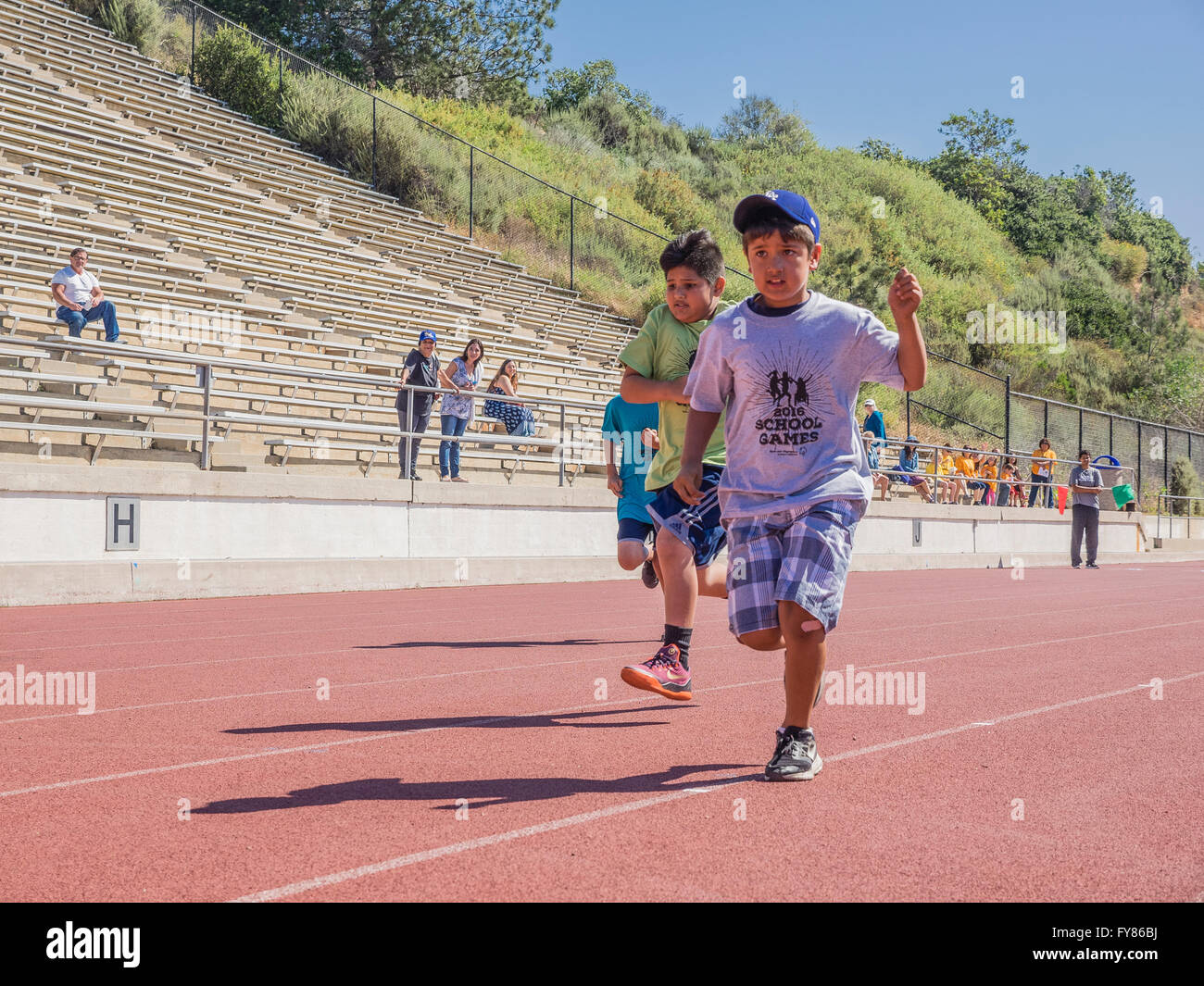 Disabled boys race at the Southern California Special Olympics held at La Playa Stadium at Santa Barbara City College. Stock Photo