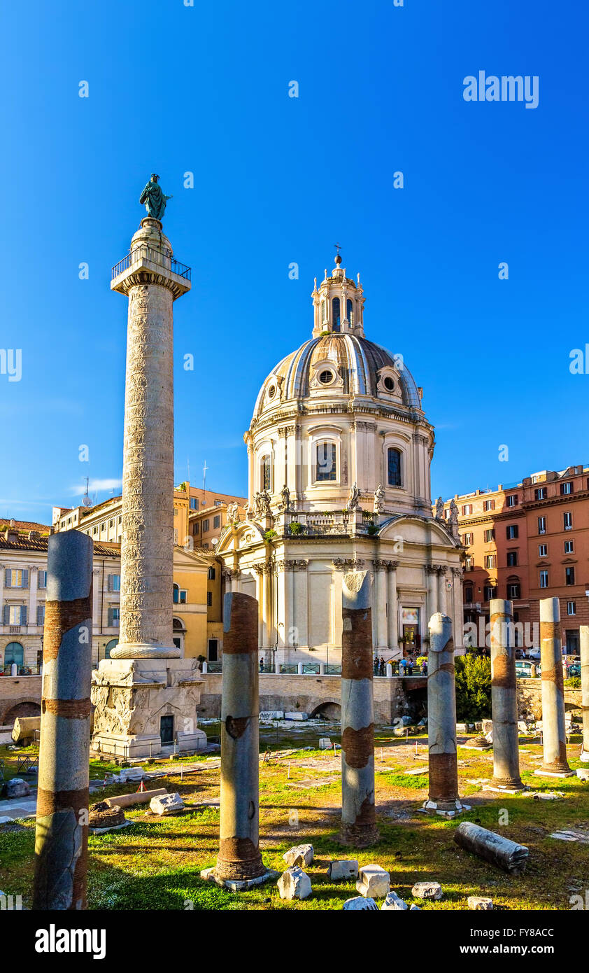 Trajan's Column and Santissimo Nome di Maria al Foro Traiano Church in Rome Stock Photo