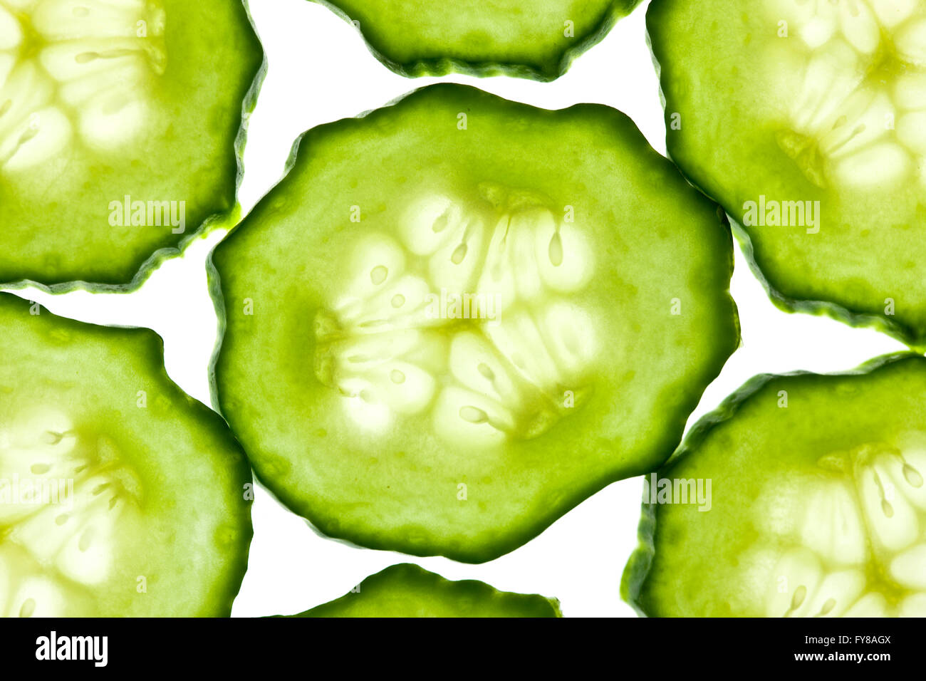 Cucumber sliced and isolated on white Stock Photo