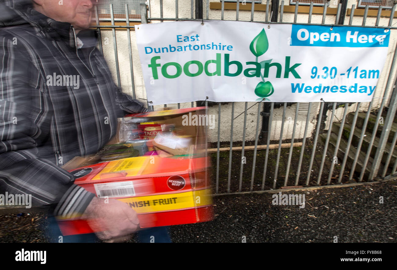 someone leaving foodbank with supplies Stock Photo
