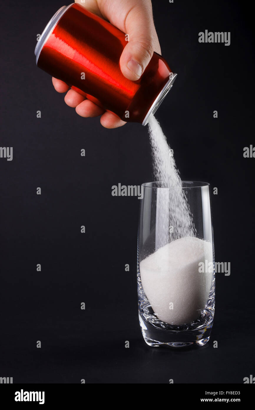 Unhealthy food concept - sugar in carbonated drinks. High amount of sugar in beverages Stock Photo